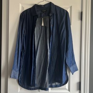 Long sleeve button up blouse.